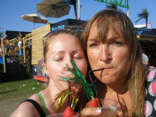 The Time Traveller ponders her next move while sipping a barin-cooling drink at Roskilde Festival 2008.